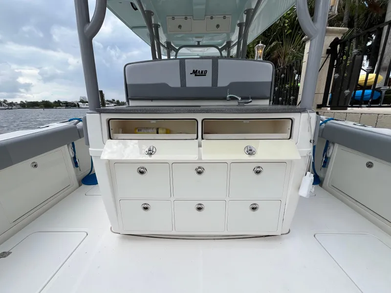 Slide: The Image of 2017 Mako 414 CC Bluewater Family Edition boat interior with storage compartments. - 38