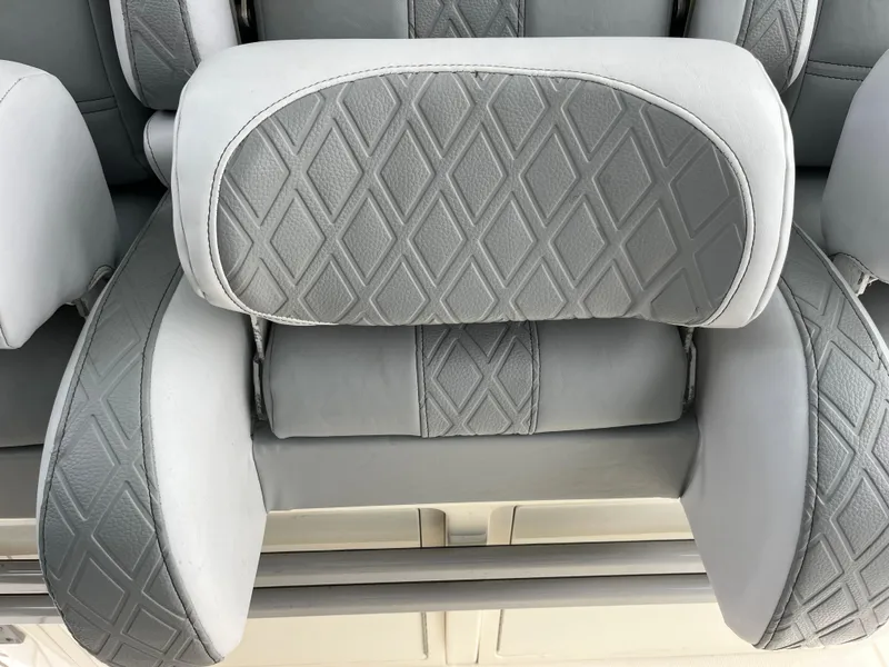 Slide: The Image of Diamond-patterned upholstery on 2017 Mako 414 CC Bluewater Family Edition boat seats. - 45