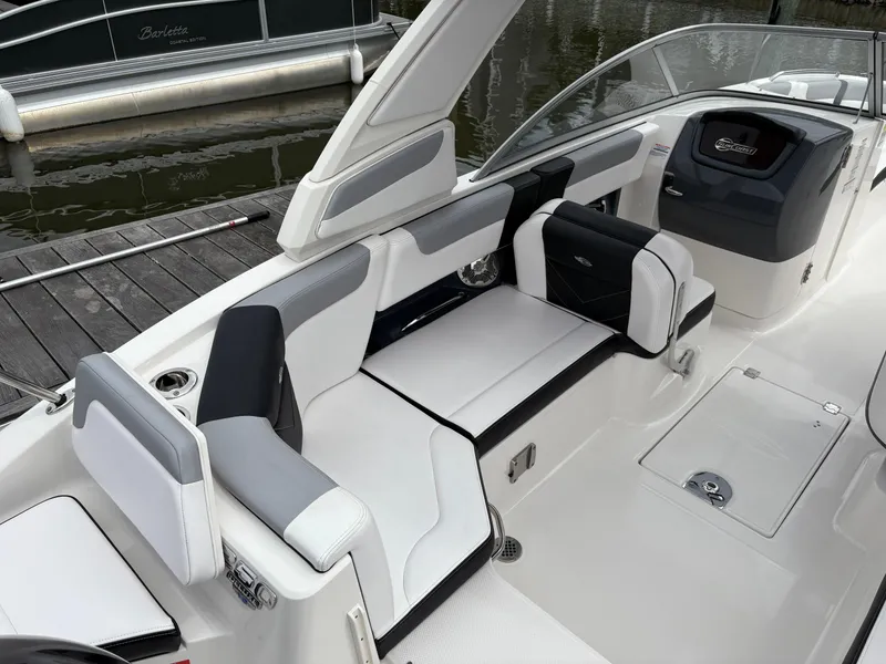 Slide: The Image of 2020 Chaparral 250 Suncoast boat interior with sleek seating and modern design. - 9