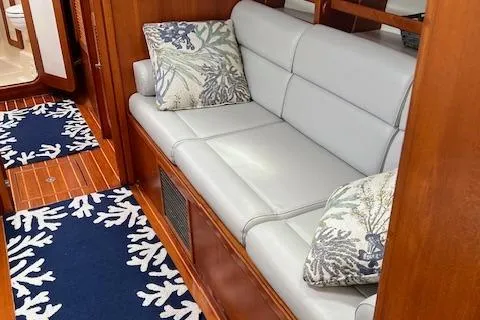 Slide: The Image of Luxurious 2003 Caliber 40LRC yacht interior with elegant seating and nautical-themed decor. - 15