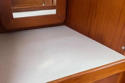 Slide: The Image of Wooden interior of 2003 Caliber 40LRC sailboat with mirror and countertop. - 28