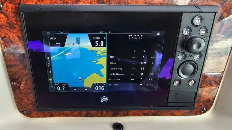 Slide: The Image of Dashboard display of a 2007 Sea Ray 340 Sundancer showing navigation and engine data. - 15
