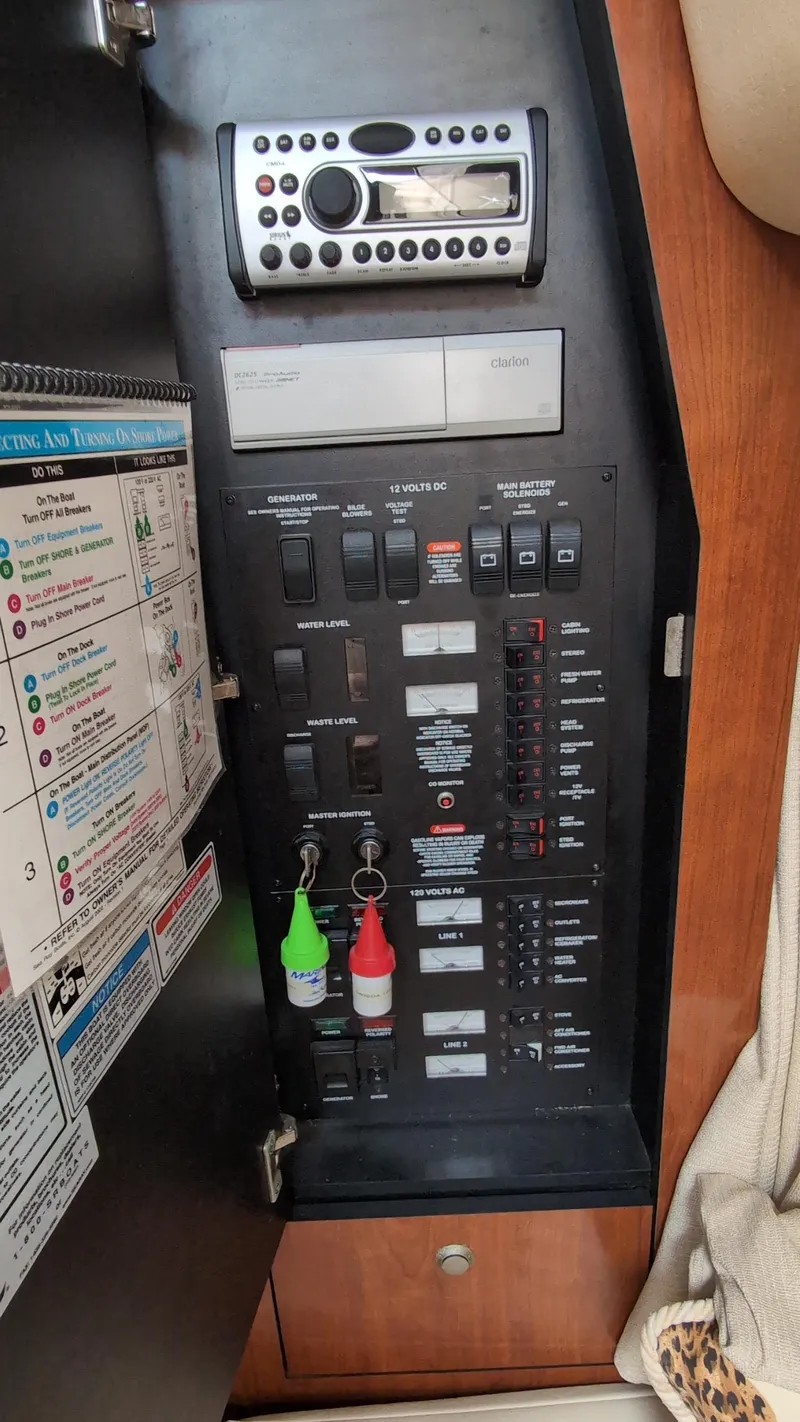 Slide: The Image of Electrical control panel on a 2007 Sea Ray 340 Sundancer boat. - 34