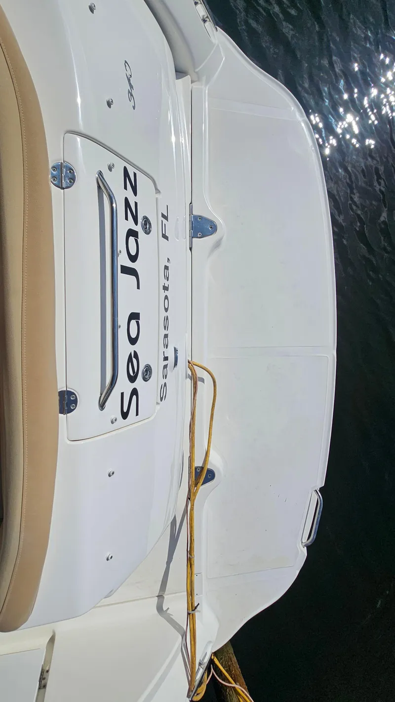 Slide: The Image of 2007 Sea Ray 340 Sundancer boat named "Sea Jazz" docked in Sarasota, FL. - 42
