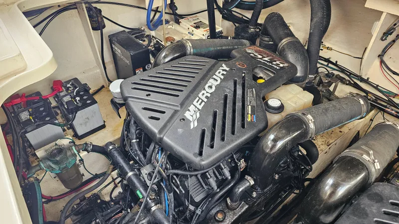 Slide: The Image of Engine compartment of a 2007 Sea Ray 340 Sundancer with Mercury engine. - 45