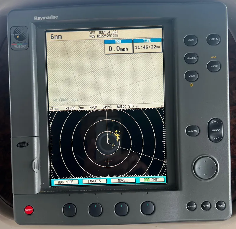 Slide: The Image of Raymarine radar display on 2000 Sea Ray 380 Sundancer, showing navigation data and radar targets. - 15