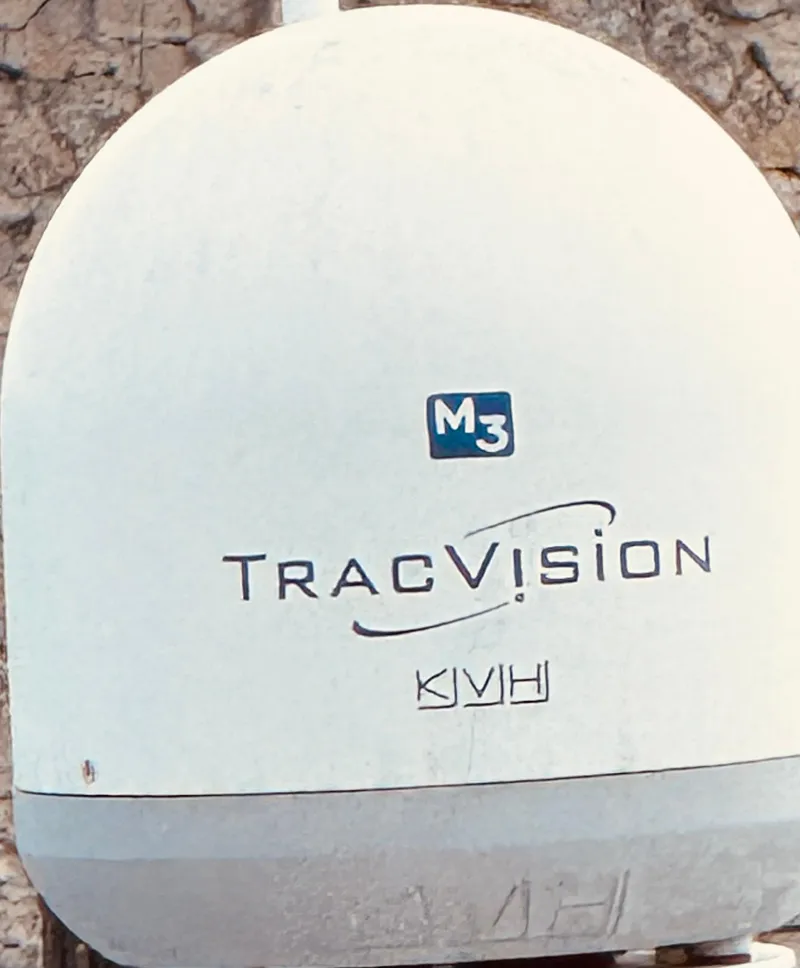 Slide: The Image of KVH TracVision M3 satellite dome on a 2000 Sea Ray 380 Sundancer. - 21