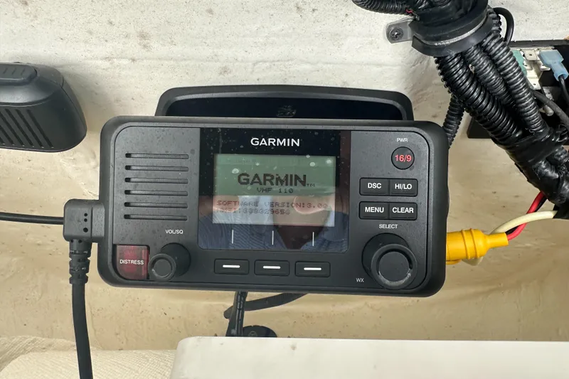 Slide: The Image of Garmin VHF 110 radio installed on a 2019 Sea Hunt Ultra 225 boat. - 22