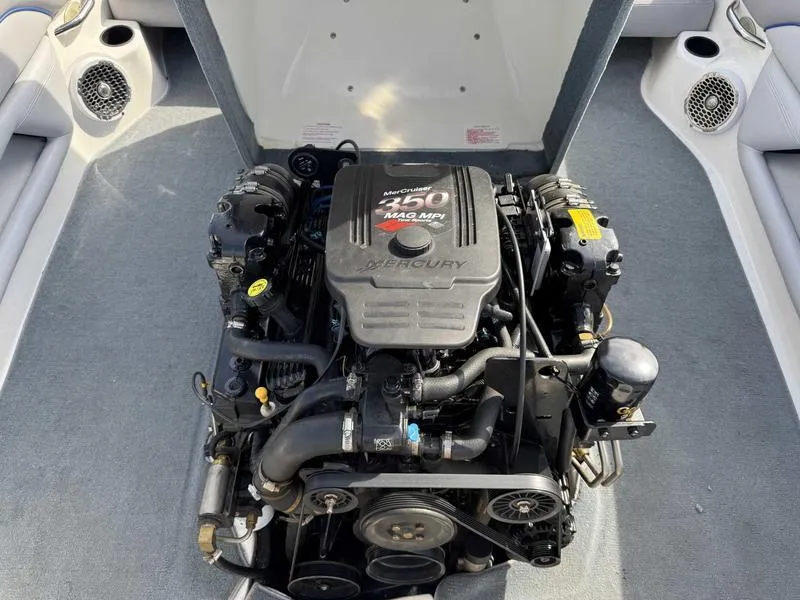 Slide: The Image of 2005 Centurion Elite boat engine, MerCruiser 350 MAG MPI, in open compartment. - 3