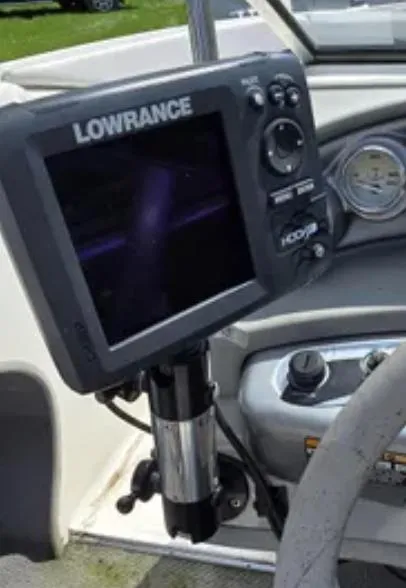 Slide: The Image of Lowrance fish finder on 2006 Bayliner 205 BR boat dashboard. - 12
