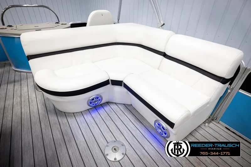 Slide: The Image of 2020 Trifecta 20 RFC CS boat interior with white seating and blue LED lights. - 21