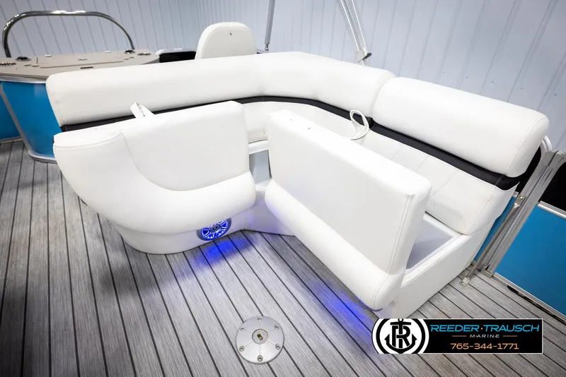 Slide: The Image of 2020 Trifecta 20 RFC CS boat interior with white seating and blue LED lighting. - 23