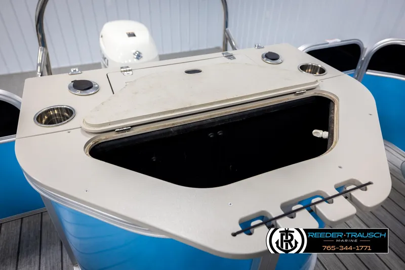 Slide: The Image of 2020 Trifecta 20 RFC CS boat console with storage compartment and cup holders. - 26