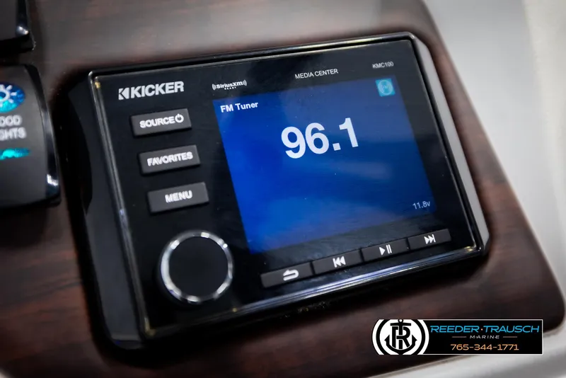 Slide: The Image of Kicker media center displaying FM tuner at 96.1, installed in Trifecta 20 RFC CS boat. - 34