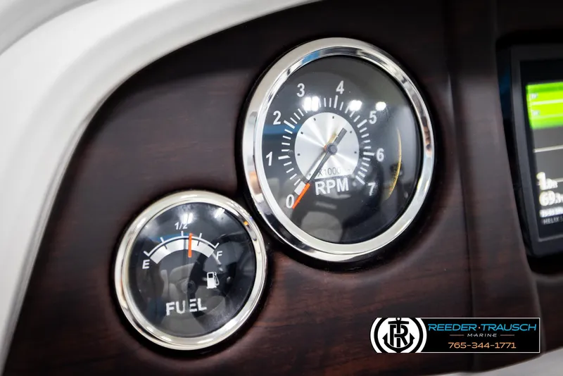 Slide: The Image of Dashboard of 2020 Trifecta 20 RFC CS with RPM and fuel gauges. - 36