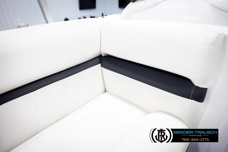 Slide: The Image of White and black seating on 2020 Trifecta 20 RFC CS boat, Reeder-Trausch Marine logo visible. - 44