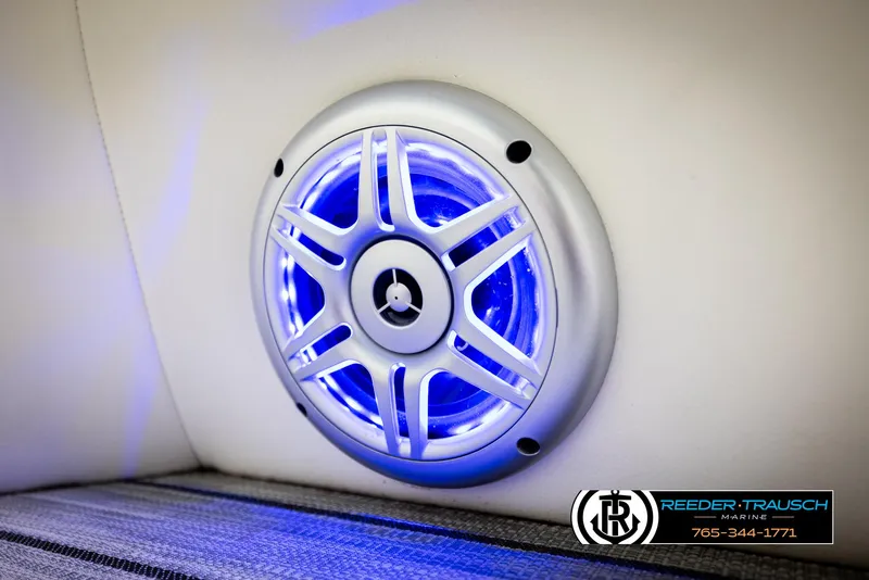 Slide: The Image of Illuminated speaker on 2020 Trifecta 20 RFC CS boat interior, featuring blue LED lighting. - 47