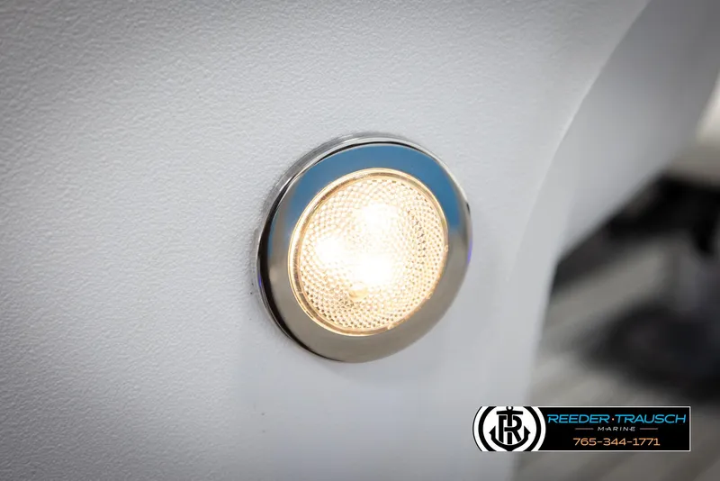 Slide: The Image of LED light on 2020 Trifecta 20 RFC CS boat interior, Reeder-Trausch Marine logo visible. - 48