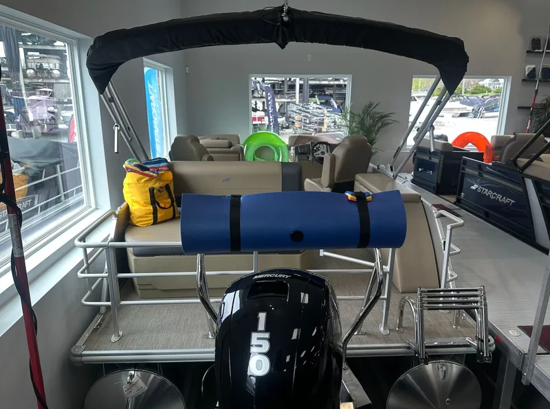 Slide: The Image of Interior view of a 2026 Starcraft EX 22 R boat. - 4