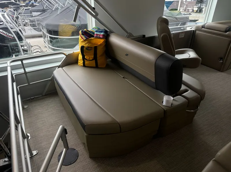 Slide: The Image of Interior of 2026 Starcraft EX 22 R with seating area and yellow bag. - 5