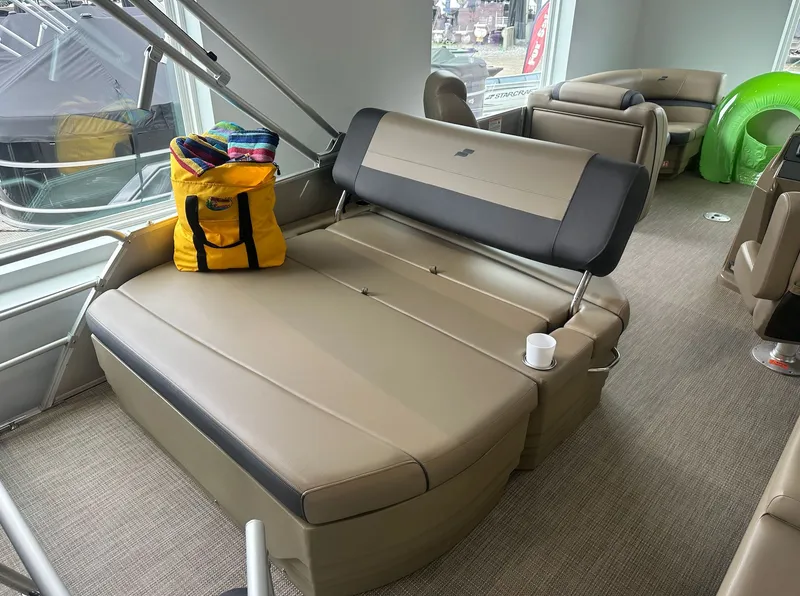 Slide: The Image of Interior of 2026 Starcraft EX 22 R with seating and yellow bag. - 6