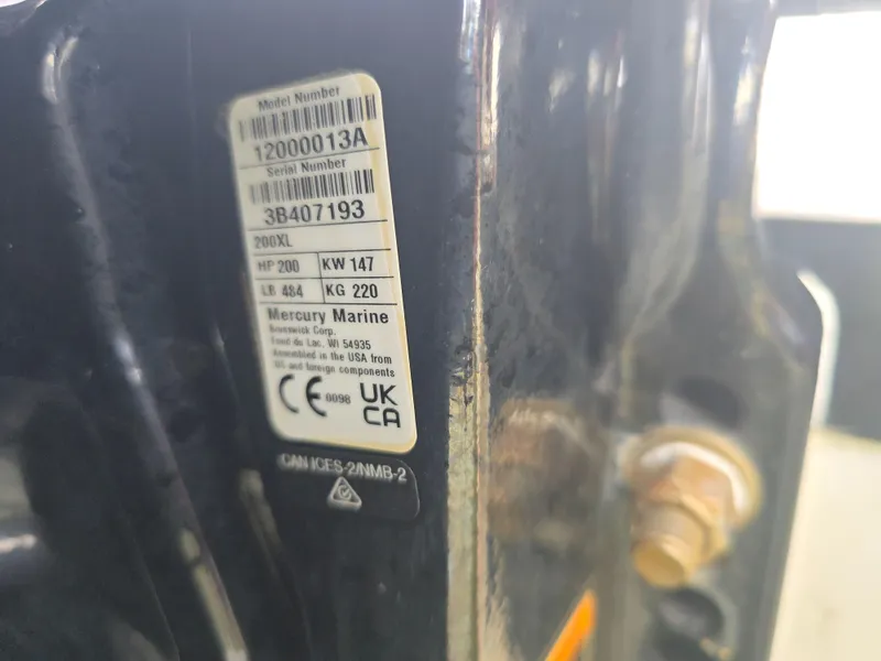 Slide: The Image of Label on Mercury Marine engine, model 200XL, for 2024 Aquasport 2200 Center Console. - 5