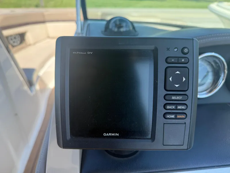 Slide: The Image of Garmin echomap DV on 2011 Sea Ray 250 SLX boat dashboard. - 12