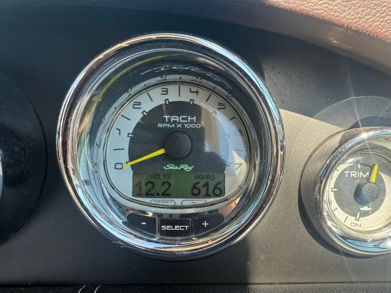 Slide: The Image of Tachometer of 2011 Sea Ray 250 SLX showing 12.2 volts and 616 hours. - 26