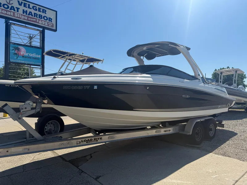 Slide: The Image of 2011 Sea Ray 250 SLX boat on trailer at Velger Boat Harbor. - 35