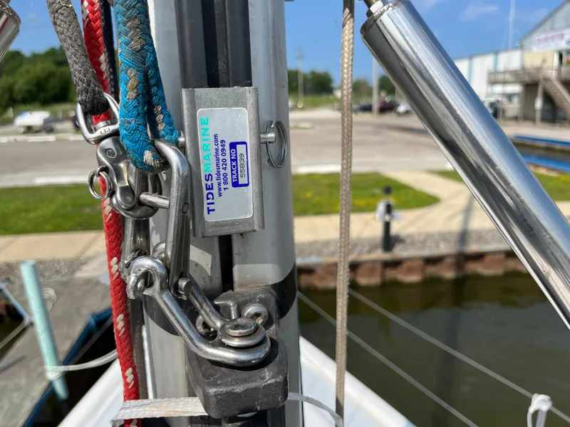 Slide: The Image of Close-up of a 2000 Hunter 340 sailboat rigging with Tides Marine hardware. - 12