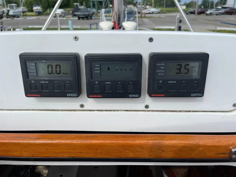 Slide: The Image of Digital displays on a 2000 Hunter 340 sailboat showing speed, wind, and depth readings. - 22