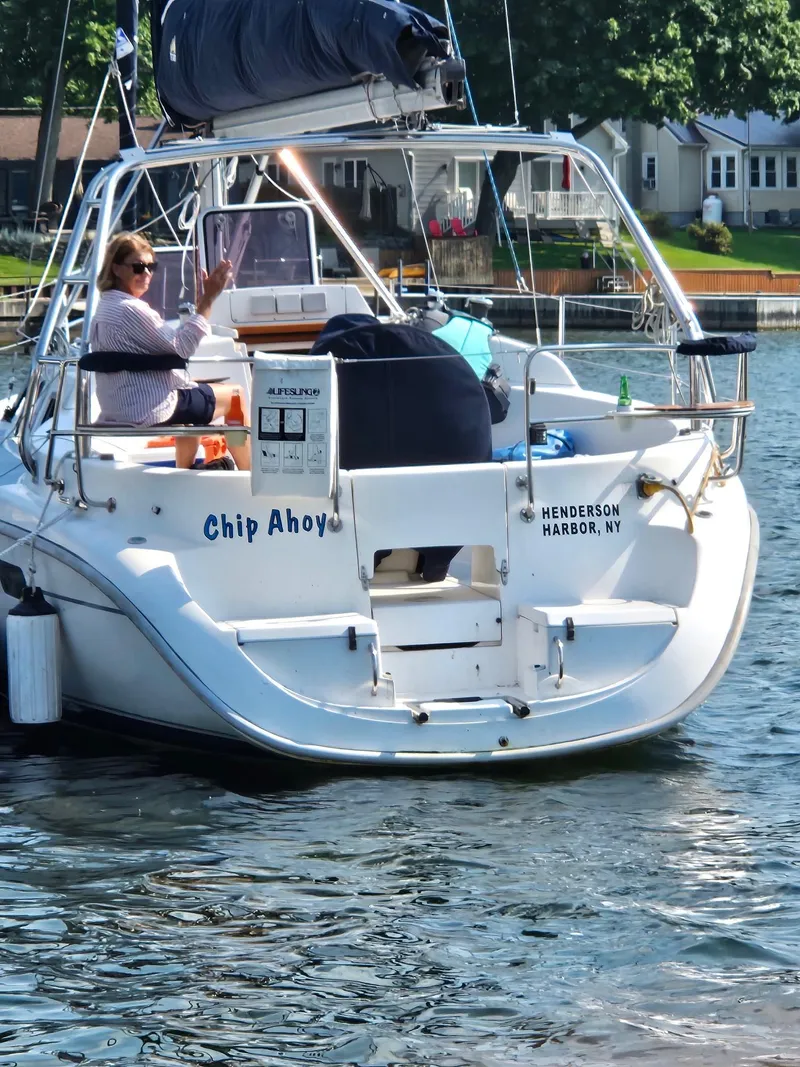 Slide: The Image of Hunter 340 sailboat named "Chip Ahoy" in Henderson Harbor, NY, 2000 model. - 4