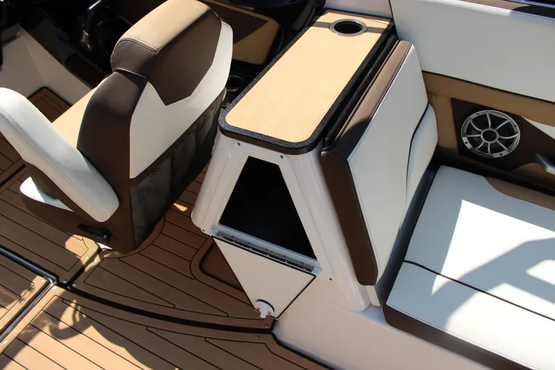 Slide: The Image of 2022 Yamaha Boats 252S interior with seating and storage compartment. - 17