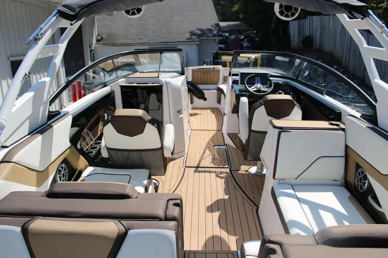 Slide: The Image of 2022 Yamaha Boats 252S interior with sleek seating and modern design. - 4