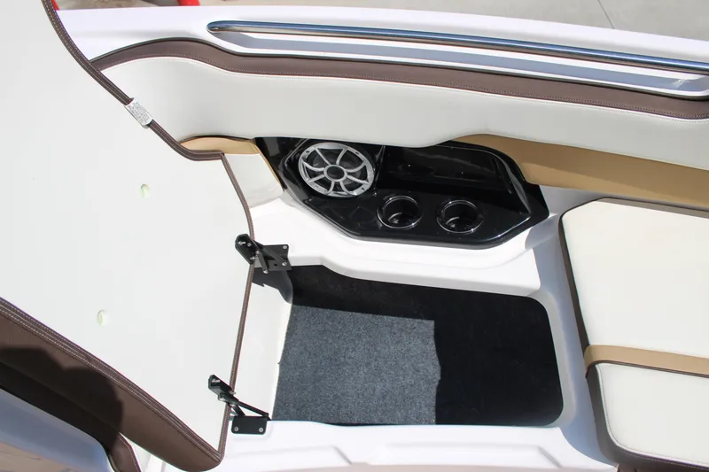 Slide: The Image of Interior of 2022 Yamaha Boats 252S with speaker and cup holders. - 7