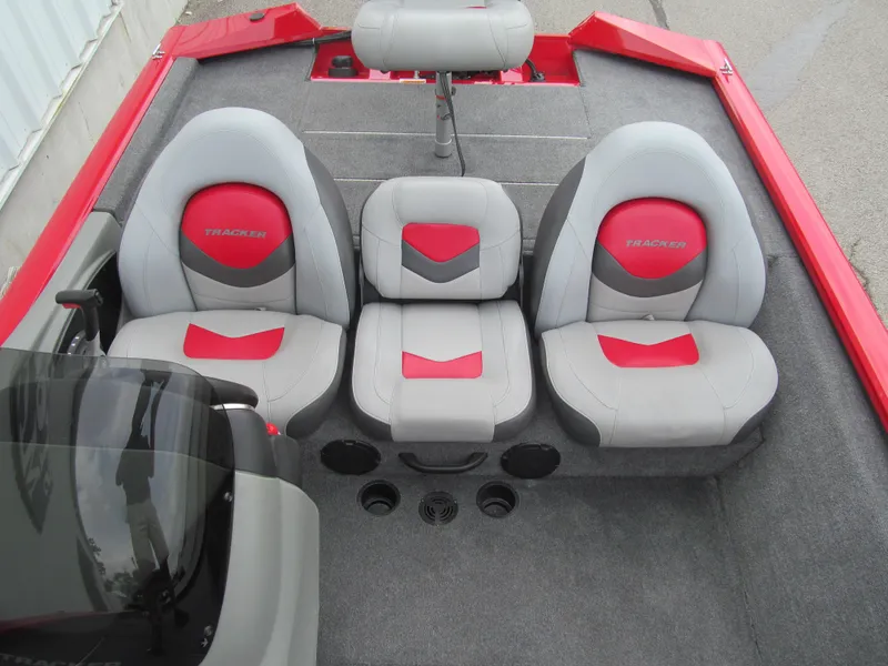 Slide: The Image of 2014 Tracker Pro Team 175 TXW boat interior with red and gray seating. - 11