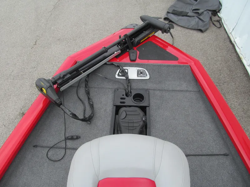 Slide: The Image of 2014 Tracker Pro Team 175 TXW boat interior with trolling motor and seating. - 9