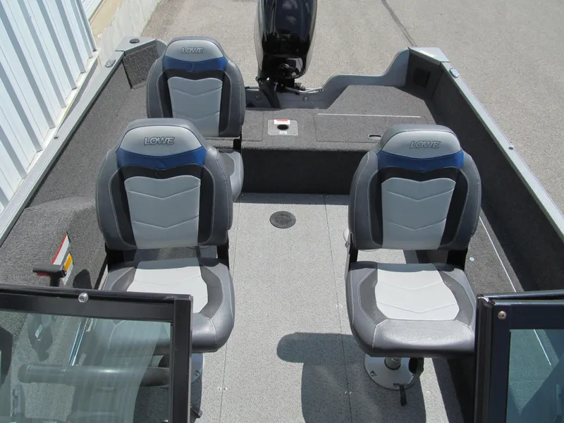 Slide: The Image of 2017 Lowe FM 165 Pro WT boat interior with two cushioned seats. - 11
