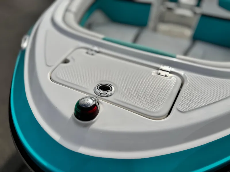 Slide: The Image of 2015 Chaparral Vortex 203 VRX boat bow with storage compartment and navigation light. - 11