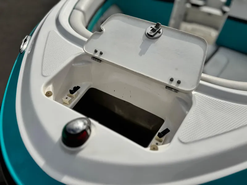 Slide: The Image of 2015 Chaparral Vortex 203 VRX boat storage compartment with open hatch. - 12
