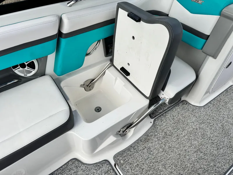 Slide: The Image of 2015 Chaparral Vortex 203 VRX boat interior with open storage compartment. - 25