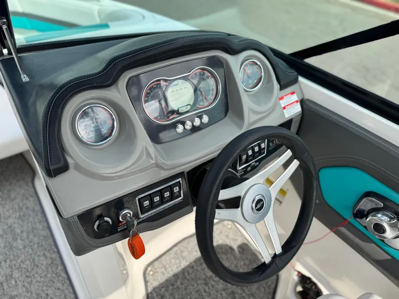 Slide: The Image of 2015 Chaparral Vortex 203 VRX dashboard with steering wheel and gauges. - 31