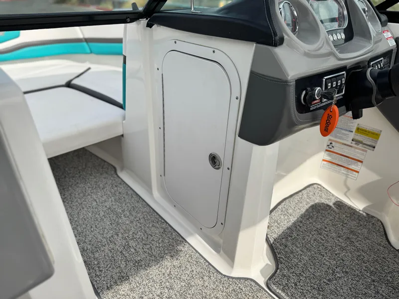 Slide: The Image of Interior of 2015 Chaparral Vortex 203 VRX boat, featuring dashboard and seating area. - 32