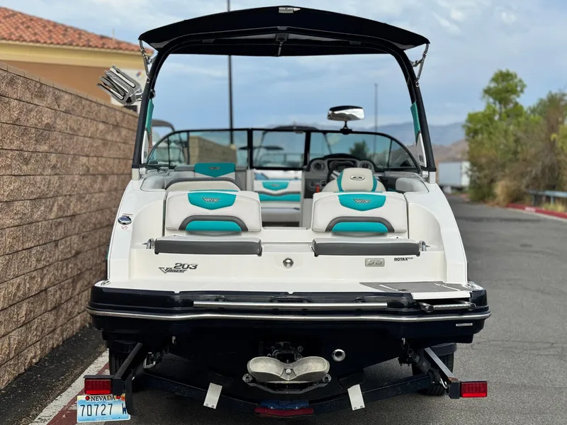 Slide: The Image of 2015 Chaparral Vortex 203 VRX boat, rear view, parked on a trailer. - 4