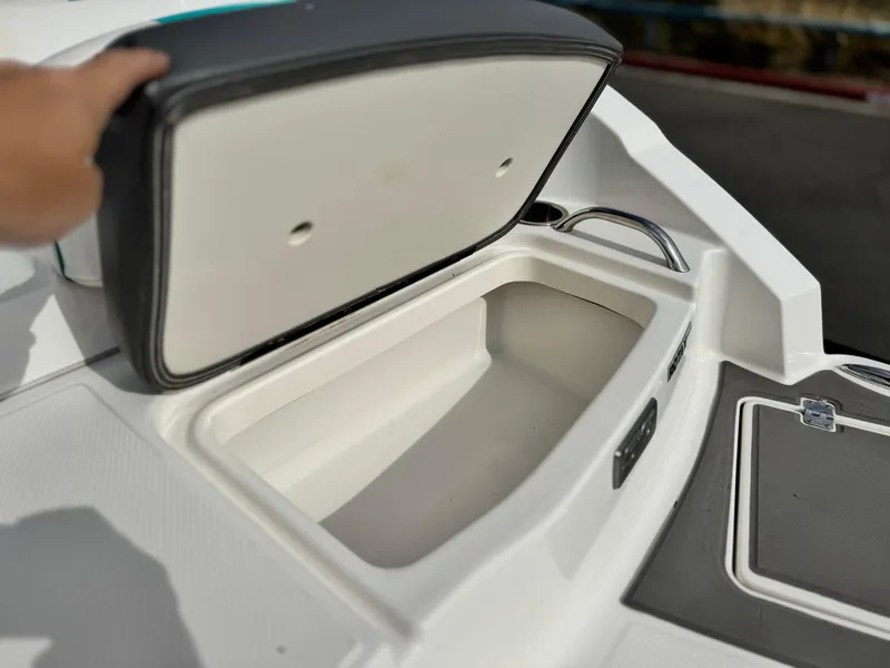Slide: The Image of Open storage compartment on 2015 Chaparral Vortex 203 VRX boat. - 7