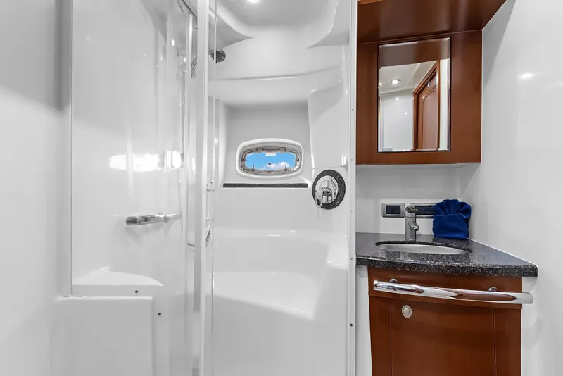 Slide: The Image of Luxurious bathroom interior of 2006 Sea Ray 60 Sundancer yacht with modern fixtures. - 10