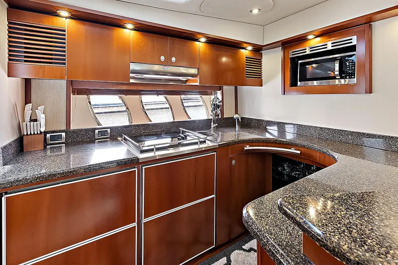 Slide: The Image of Luxurious kitchen interior of 2006 Sea Ray 60 Sundancer yacht with modern appliances. - 3