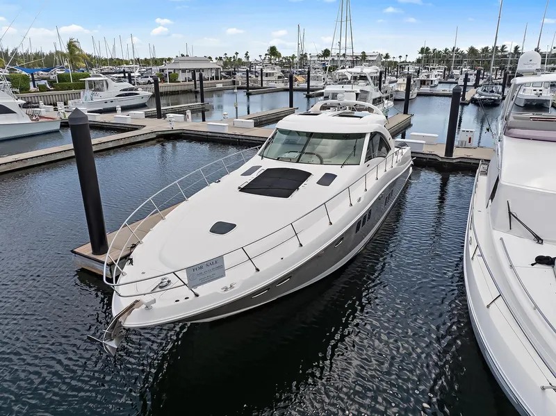 Slide: The Image of 2006 Sea Ray 60 Sundancer yacht docked at marina, available for sale. - 31