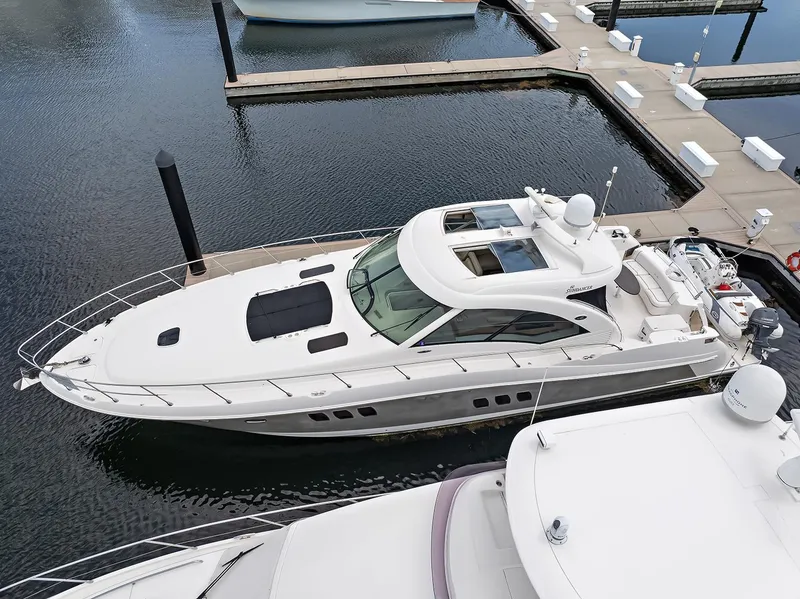 Slide: The Image of 2006 Sea Ray 60 Sundancer yacht docked at marina, aerial view. - 32