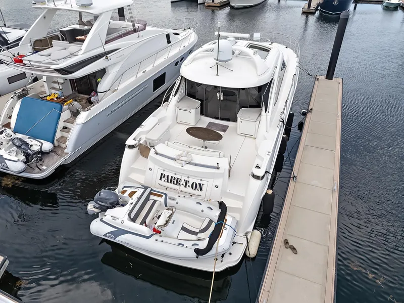 Slide: The Image of 2006 Sea Ray 60 Sundancer yacht docked at marina, aerial view. - 35
